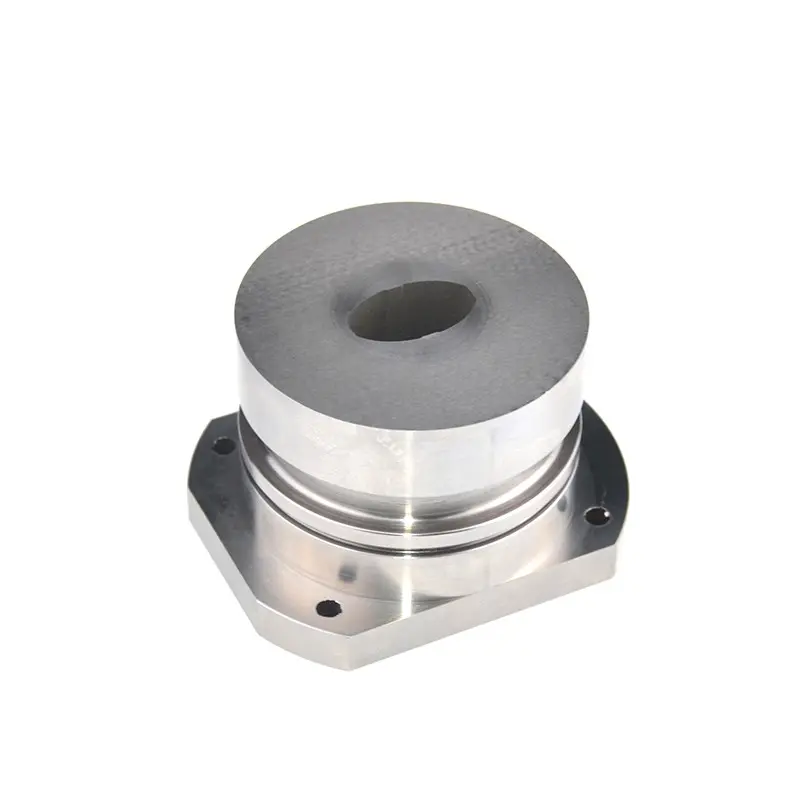 Cylindrical precision machined metal part with a central bore and mounting holes in the base flange